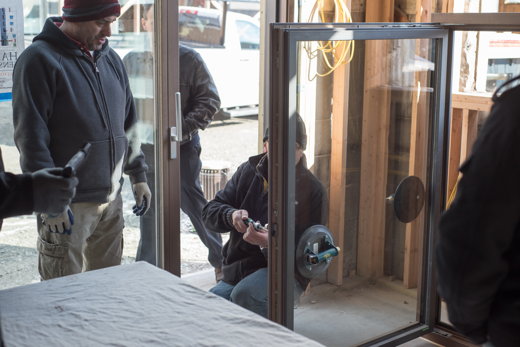 Our team installing New Construction Windows into our HF Studio during the development process in 2019